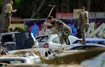 Soldiers search wrecked cars damaged by flooding in Massassana, region of Valencia. (AFP) Soldiers search wrecked cars damaged by flooding in Massassana, region of Valencia. (AFP)