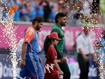 Pakistan star batter Babar Azam, right, and India's captain Rohit Sharma.