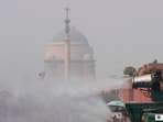 An anti-smog gun being used to spray water droplets to curb air pollution
