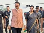 Maharashtra deputy chief minister Devendra Fadnavis with BJP leader Navneet Rana during an election rally ahead. Maharashtra deputy chief minister Devendra Fadnavis with BJP leader Navneet Rana during an election rally ahead.