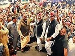 Samajwadi Party president Akhilesh Yadav with party’s Maharashtra chief Abu Asim Azmi and party workers. (FILE PHOTO) Samajwadi Party president Akhilesh Yadav with party’s Maharashtra chief Abu Asim Azmi and party workers. (FILE PHOTO)