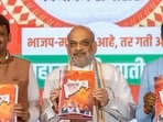Union home minister Amit Shah along with Maharashtra Dy CM Devendra Fadnavis, state BJP chief Chandrashekhar Bawankule and others release Bharatiya Janata Party (BJP) manifesto for the state Assembly elections in Mumbai, on Sunday. (Satish Bate/HT photo) Union home minister Amit Shah along with Maharashtra Dy CM Devendra Fadnavis, state BJP chief Chandrashekhar Bawankule and others release Bharatiya Janata Party (BJP) manifesto for the state Assembly elections in Mumbai, on Sunday. (Satish Bate/HT photo)