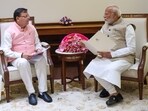 Uttarakhand chief minister Pushkar Singh Dhami with Prime Minister Narendra Modi. Uttarakhand chief minister Pushkar Singh Dhami with Prime Minister Narendra Modi.