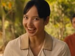 The White Lotus season 3 first glimpse introduces BLACKPINK's Lisa as Thailand hotel receptionist.