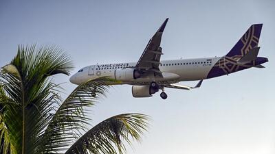 A Vistara aircraft prepares for landing at the Trivandrum International Airport on Monday. (PTI) A Vistara aircraft prepares for landing at the Trivandrum International Airport on Monday. (PTI)