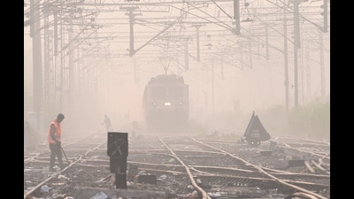 A train approaches amid heavy smog on the Kotgaon railway track in Ghaziabad on Monday. (Sakib Ali/HT Photo) A train approaches amid heavy smog on the Kotgaon railway track in Ghaziabad on Monday. (Sakib Ali/HT Photo)