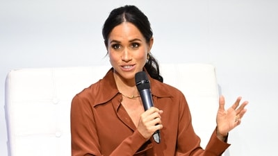 Meghan Markle's blunt response on being confronted over bullying allegations (Photo by Raul ARBOLEDA / AFP) (AFP) Meghan Markle's blunt response on being confronted over bullying allegations (Photo by Raul ARBOLEDA / AFP) (AFP)