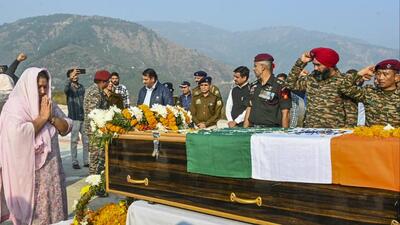 Family members security personnel pay their last respects to Naib Subedar Rakesh Kumar, who was killed in an encounter in Kishtwar. (PTI) Family members security personnel pay their last respects to Naib Subedar Rakesh Kumar, who was killed in an encounter in Kishtwar. (PTI)