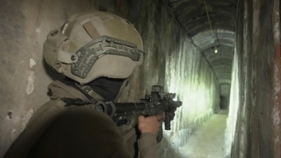 FILE - Israeli soldier shows the media an underground tunnel found underneath Shifa Hospital in Gaza City, Nov. 22, 2023. (AP Photo/Victor R. Caivano, File) (AP) FILE - Israeli soldier shows the media an underground tunnel found underneath Shifa Hospital in Gaza City, Nov. 22, 2023. (AP Photo/Victor R. Caivano, File) (AP)