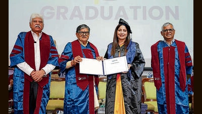 Punjab governor Gulab Chand Kataria awarding degree to a student in the presence of ISB dean Madan Pillutla (right) and chairman of the advisory council at ISB, Mohali, Rakesh Bharti Mittal (left) during the graduation ceremony at the institute in Mohali on Monday. (HT Photo) Punjab governor Gulab Chand Kataria awarding degree to a student in the presence of ISB dean Madan Pillutla (right) and chairman of the advisory council at ISB, Mohali, Rakesh Bharti Mittal (left) during the graduation ceremony at the institute in Mohali on Monday. (HT Photo)