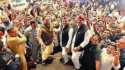 Samajwadi Party president Akhilesh Yadav with party’s Maharashtra chief Abu Asim Azmi and party workers. (FILE PHOTO) Samajwadi Party president Akhilesh Yadav with party’s Maharashtra chief Abu Asim Azmi and party workers. (FILE PHOTO)