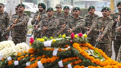 Soldiers paying their last respects to Naib Subedar Rakesh Kumar during a ceremony in Jammu on Monday. The junior commissioned officer was killed in an encounter with terrorists in Jammu and Kashmir’s Kishtwar district on Sunday. (PTI Photo) Soldiers paying their last respects to Naib Subedar Rakesh Kumar during a ceremony in Jammu on Monday. The junior commissioned officer was killed in an encounter with terrorists in Jammu and Kashmir’s Kishtwar district on Sunday. (PTI Photo)
