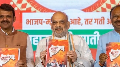 Union home minister Amit Shah along with Maharashtra Dy CM Devendra Fadnavis, state BJP chief Chandrashekhar Bawankule and others release Bharatiya Janata Party (BJP) manifesto for the state Assembly elections in Mumbai, on Sunday. (Satish Bate/HT photo) Union home minister Amit Shah along with Maharashtra Dy CM Devendra Fadnavis, state BJP chief Chandrashekhar Bawankule and others release Bharatiya Janata Party (BJP) manifesto for the state Assembly elections in Mumbai, on Sunday. (Satish Bate/HT photo)