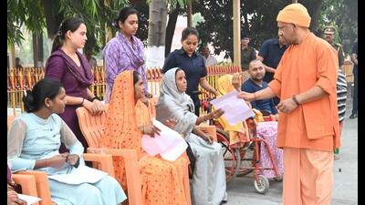 Uttar Pradesh chief minister Yogi Adityanath listening to people’s problems at Janata Darshan event in Gorakhpur. (HT photo) Uttar Pradesh chief minister Yogi Adityanath listening to people’s problems at Janata Darshan event in Gorakhpur. (HT photo)
