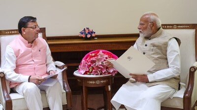 Uttarakhand chief minister Pushkar Singh Dhami with Prime Minister Narendra Modi. Uttarakhand chief minister Pushkar Singh Dhami with Prime Minister Narendra Modi.