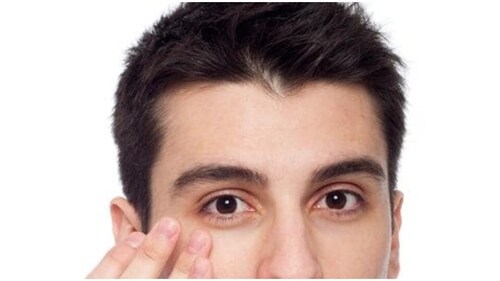 Eye cream: The area near your eyes are very sensitive and needs extra care. Gently applying an undereye cream before going to bed will keep fine lines and wrinkles away. (File image) Eye cream: The area near your eyes are very sensitive and needs extra care. Gently applying an undereye cream before going to bed will keep fine lines and wrinkles away. (File image)