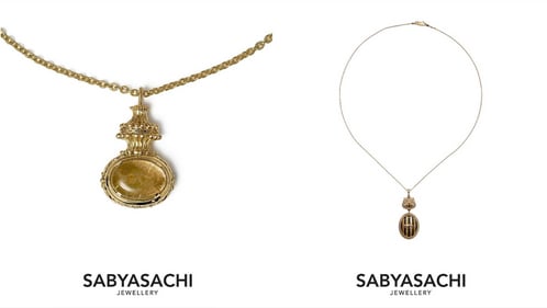 Shah Rukh Khan's necklace stack. Shah Rukh Khan's necklace stack.