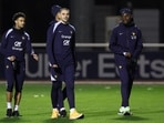 (L-R) France's midfielder #18 Warren Zaire Emery, France's goalkeeper Lucas Chevalier and France's midfielder Manu Kone attend a training session in Clairefontaine-en-Yvelines on November 11, 2024 as part of the team's preparation for upcoming UEFA Nations League qualifying matches against Israel and Italy. (L-R) France's midfielder #18 Warren Zaire Emery, France's goalkeeper Lucas Chevalier and France's midfielder Manu Kone attend a training session in Clairefontaine-en-Yvelines on November 11, 2024 as part of the team's preparation for upcoming UEFA Nations League qualifying matches against Israel and Italy.