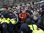 Protesters take part in a Pro-Palestinian demonstration on Dam Square in Amsterdam on November 10. The protest was taking place while an emergency ordinance and demonstration ban are in place in the city. These were previously deployed following tensions and violence surrounding supporters of Israeli football club Maccabi Tel Aviv. (AFP) Protesters take part in a Pro-Palestinian demonstration on Dam Square in Amsterdam on November 10. The protest was taking place while an emergency ordinance and demonstration ban are in place in the city. These were previously deployed following tensions and violence surrounding supporters of Israeli football club Maccabi Tel Aviv. (AFP)