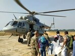 Polling officials with EVMs and other election materials board a helicopter to reach the LWE-affected areas for the first phase of Jharkhand Assembly election at Chaibasa. (PTI) Polling officials with EVMs and other election materials board a helicopter to reach the LWE-affected areas for the first phase of Jharkhand Assembly election at Chaibasa. (PTI)