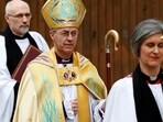 The new Archbishop of Canterbury Justin Welby arrives for his enthronement ceremony, at Canterbury Cathedral in Canterbury, southern England March 21, 2013. REUTERS/Luke MacGregor/File Photo