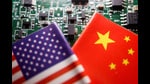 FILE PHOTO: Flags of China and U.S. are displayed on a printed circuit board with semiconductor chips, in this illustration picture taken February 17, 2023. REUTERS/Florence Lo/Illustration/File Photo (REUTERS)