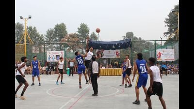 A basketball match in progress at Gurukul Global School on Tuesday. (HT File)