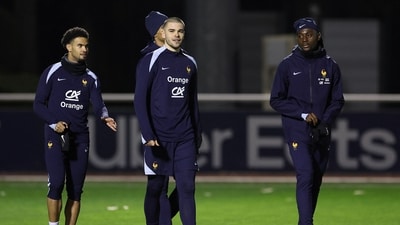 (L-R) France's midfielder #18 Warren Zaire Emery, France's goalkeeper Lucas Chevalier and France's midfielder Manu Kone attend a training session in Clairefontaine-en-Yvelines on November 11, 2024 as part of the team's preparation for upcoming UEFA Nations League qualifying matches against Israel and Italy. (AFP) (L-R) France's midfielder #18 Warren Zaire Emery, France's goalkeeper Lucas Chevalier and France's midfielder Manu Kone attend a training session in Clairefontaine-en-Yvelines on November 11, 2024 as part of the team's preparation for upcoming UEFA Nations League qualifying matches against Israel and Italy. (AFP)