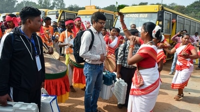 Tribal women perform well wishing for the polling officials prior to the departure for the election duty on the eve of first phase of Jharkhand Assembly elections, at Morabadi Football ground, in Ranchi on Tuesday. (ANI) Tribal women perform well wishing for the polling officials prior to the departure for the election duty on the eve of first phase of Jharkhand Assembly elections, at Morabadi Football ground, in Ranchi on Tuesday. (ANI)