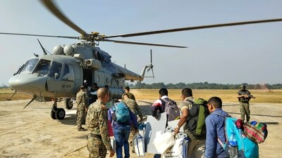 Polling officials with EVMs and other election materials board a helicopter to reach the LWE-affected areas for the first phase of Jharkhand Assembly election at Chaibasa. (PTI) (PTI) Polling officials with EVMs and other election materials board a helicopter to reach the LWE-affected areas for the first phase of Jharkhand Assembly election at Chaibasa. (PTI) (PTI)