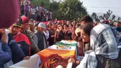 Wife of Naib Subedar Rakesh Kumar mourns after his mortal remains were brought to his residence in Mandi district. (PTI) Wife of Naib Subedar Rakesh Kumar mourns after his mortal remains were brought to his residence in Mandi district. (PTI)