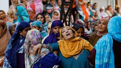 The distraught mother of the woman killed in the November 3 grenade blast during her funeral in Bandipora. (REUTERS) The distraught mother of the woman killed in the November 3 grenade blast during her funeral in Bandipora. (REUTERS)