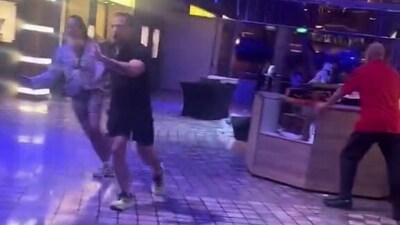 A viral video shows passengers struggling to stay upright as a cruise ship tilts into the ocean (X/@FearedBuck) A viral video shows passengers struggling to stay upright as a cruise ship tilts into the ocean (X/@FearedBuck)