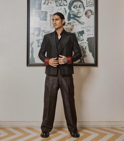 Prateik Babbar’s double-breasted tuxedo and pants were made by recycling his later mother, Smita Patil's two Kanjeevaram sarees from JADE by Monica and Karishma. Prateik Babbar’s double-breasted tuxedo and pants were made by recycling his later mother, Smita Patil's two Kanjeevaram sarees from JADE by Monica and Karishma.