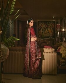 Sonam Kapoor attended a wedding wearing her mother, Sunita Kapoor's 35-year-old red Gharchola saree in traditional Gujarati style. Sonam Kapoor attended a wedding wearing her mother, Sunita Kapoor's 35-year-old red Gharchola saree in traditional Gujarati style.