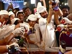 Cake mixing involves mixing dry fruits, nuts and spices with rum or wine, creating a sweet and flavorful base for Christmas cakes.(Grand Chennai )