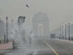 An anti-smog truck spraying mist to settle down the dust particles after the AQI in Delhi is increased at Kartavya Path in New Delhi. (HT file) An anti-smog truck spraying mist to settle down the dust particles after the AQI in Delhi is increased at Kartavya Path in New Delhi. (HT file)