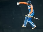 Tilak Varma celebrates after scoring a century against South Africa.