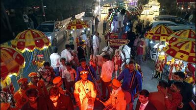 A wedding procession on a busy stretch in Ghaziabad on Wednesday. (Sakib Ali/HT Photo) A wedding procession on a busy stretch in Ghaziabad on Wednesday. (Sakib Ali/HT Photo)