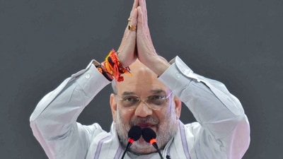Amit Shah greets BJP supporters during a public rally in Maharashtra. (ANI file photo)