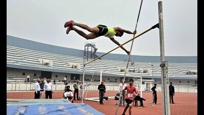 An athlete performs at the inter-district school games at the Guru Nanak Stadium on Wednesday. (Manish/HT)