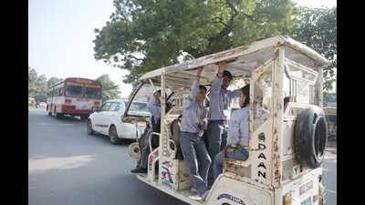 Children going to school in an e-rickshaw, in Lucknow, on Wednesday (HT Photo) Children going to school in an e-rickshaw, in Lucknow, on Wednesday (HT Photo)