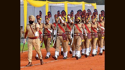 Cops during a march in Sector 26, Chandigarh, on Wednesday. (HT photo) Cops during a march in Sector 26, Chandigarh, on Wednesday. (HT photo)