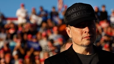 US President-elect Donald Trump on November 12, 2024, said Tesla and SpaceX CEO Elon Musk will lead a so-called Department of Government Efficiency alongside US entrepreneur Vivek Ramaswamy. (Photo by Anna Moneymaker / GETTY IMAGES NORTH AMERICA / AFP) (AFP) US President-elect Donald Trump on November 12, 2024, said Tesla and SpaceX CEO Elon Musk will lead a so-called Department of Government Efficiency alongside US entrepreneur Vivek Ramaswamy. (Photo by Anna Moneymaker / GETTY IMAGES NORTH AMERICA / AFP) (AFP)