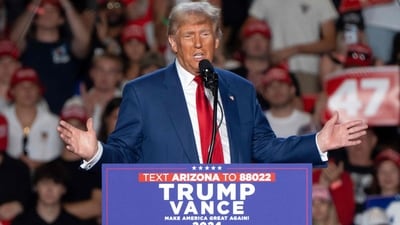 Donald Trump cited in his recent statement Elon Musk and Vivek Ramaswamy's role will focus on dismantling bureaucracy, reducing regulations, and restructuring federal agencies to support the 'Save America' Movement. (Photo by Rebecca NOBLE / AFP) (AFP) Donald Trump cited in his recent statement Elon Musk and Vivek Ramaswamy's role will focus on dismantling bureaucracy, reducing regulations, and restructuring federal agencies to support the 'Save America' Movement. (Photo by Rebecca NOBLE / AFP) (AFP)