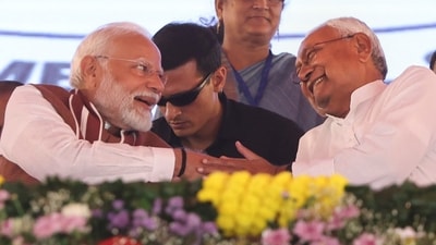 Prime Minister Narendra Modi with Bihar Chief Minister Nitish Kumar in Bihar's Darbhanga. (PTI) Prime Minister Narendra Modi with Bihar Chief Minister Nitish Kumar in Bihar's Darbhanga. (PTI)