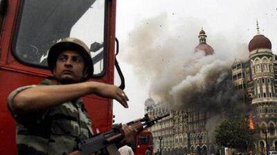 Smoke billowing out of the ground and first floors of the Taj Hotel in south Mumbai during the 26/11 terror attacks in 2008. (PTI File Photo)