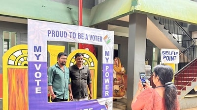 Voters get their photos clicked at a selfie booth after casting their votes for Wayanad Lok Sabha by-elections, on Wednesday. (ANI) Voters get their photos clicked at a selfie booth after casting their votes for Wayanad Lok Sabha by-elections, on Wednesday. (ANI)