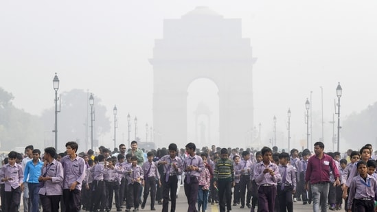 School students visit India amid low visibility due to smog as the air quality falls to ‘severe’ category, at Kartavya Path, in New Delhi on Wednesday. (ANI)
