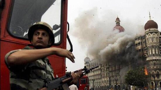 Smoke billowing out of the ground and first floors of the Taj Hotel in south Mumbai during the 26/11 terror attacks in 2008. (PTI File Photo)